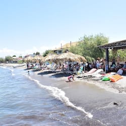On the beach, sun-loungers, beach umbrellas
