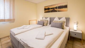 Apartment, 1 Bedroom (Souterrain; incl. EUR 35 cleaning fee) | 1 bedroom, blackout curtains, iron/ironing board, free WiFi