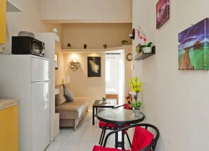 Design-Apartment | Essbereich im Zimmer