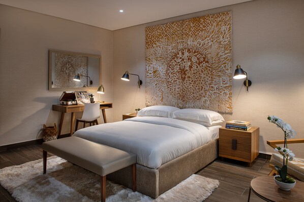 Deluxe Room | 1 bedroom, premium bedding, in-room safe, individually decorated