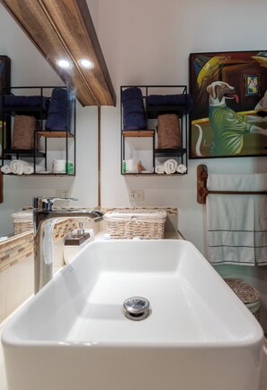 Shower, hair dryer, towels, soap