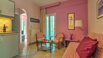 Apartment, Ground Floor | Living area | 32-inch flat-screen TV with digital channels, TV