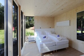 Ropa de cama de alta calidad, minibar, escritorio y cortinas blackout