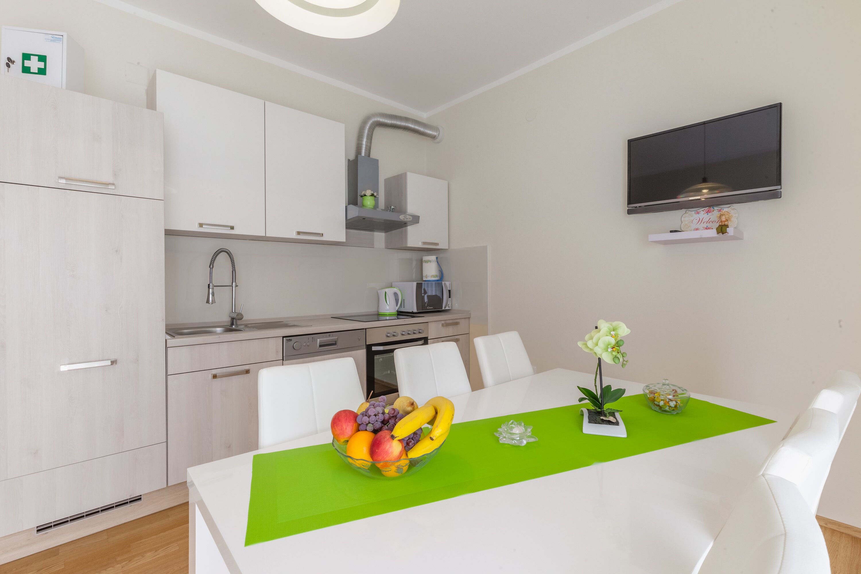 Family Apartment, 2 Bedrooms | Private kitchen | Fridge, microwave, stovetop, coffee/tea maker