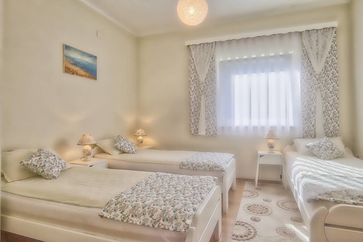 Family Apartment, 2 Bedrooms | In-room safe, laptop workspace, blackout drapes, iron/ironing board