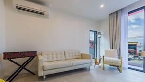 Design Studio, 1 Queen Bed | Living area | 43-inch TV with cable channels, Netflix - Portside Apartments (Oranjestad)
