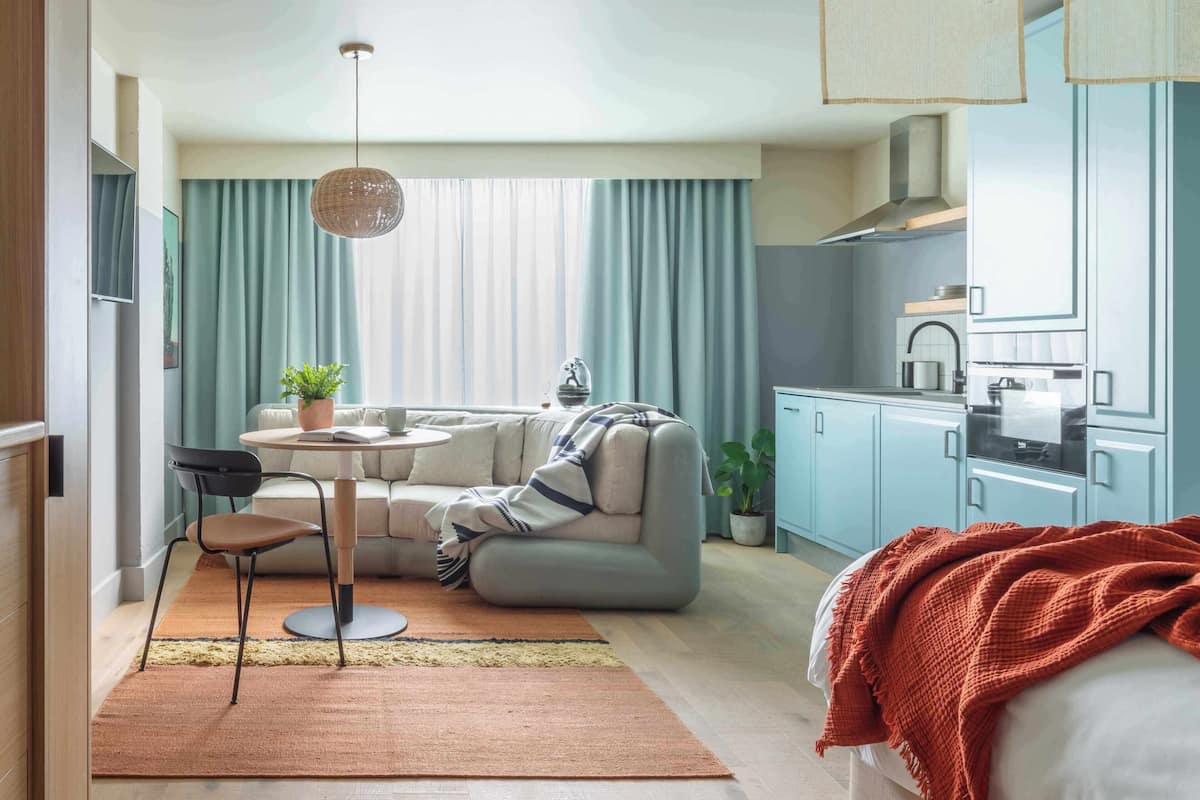 Locke Studio | Premium bedding, in-room safe, laptop workspace, blackout drapes
