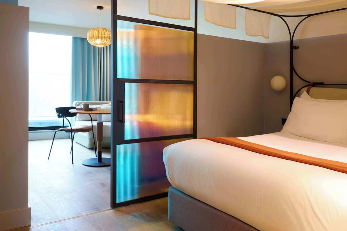 One Bedroom Suite | Premium bedding, in-room safe, laptop workspace, blackout drapes