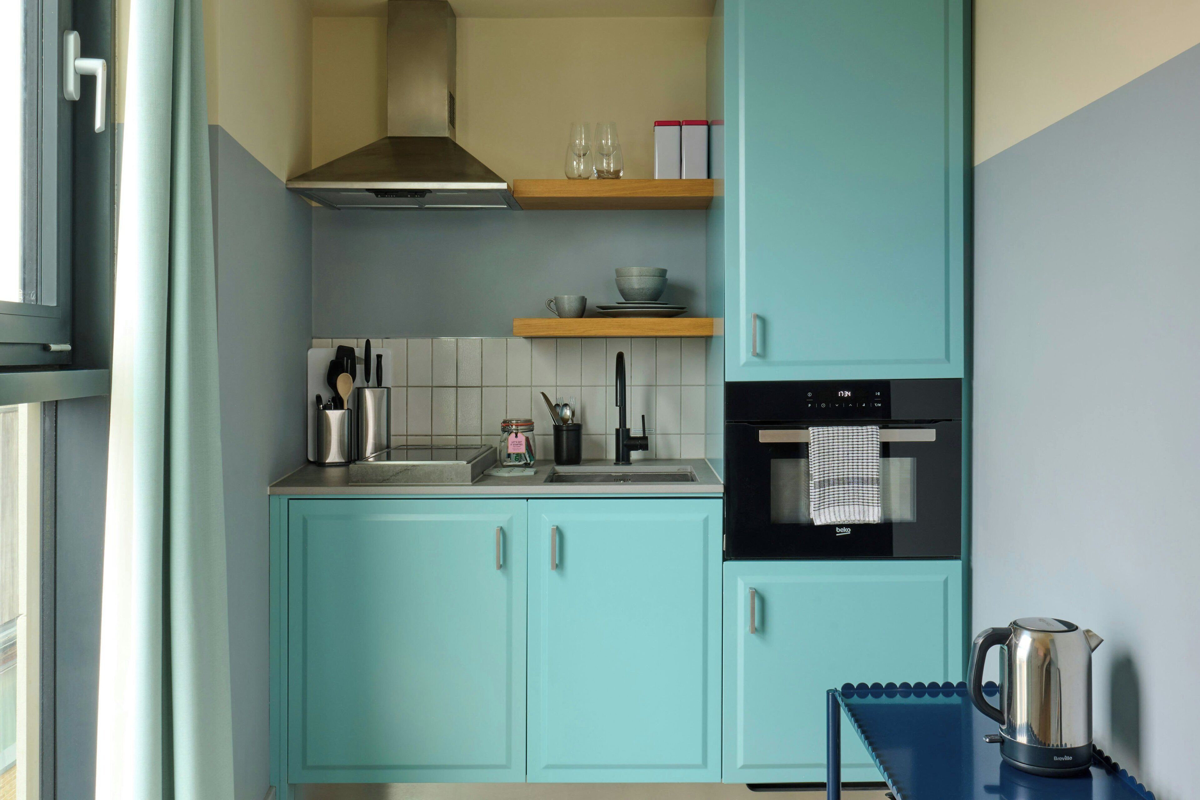 Fridge, microwave, stovetop, coffee/tea maker