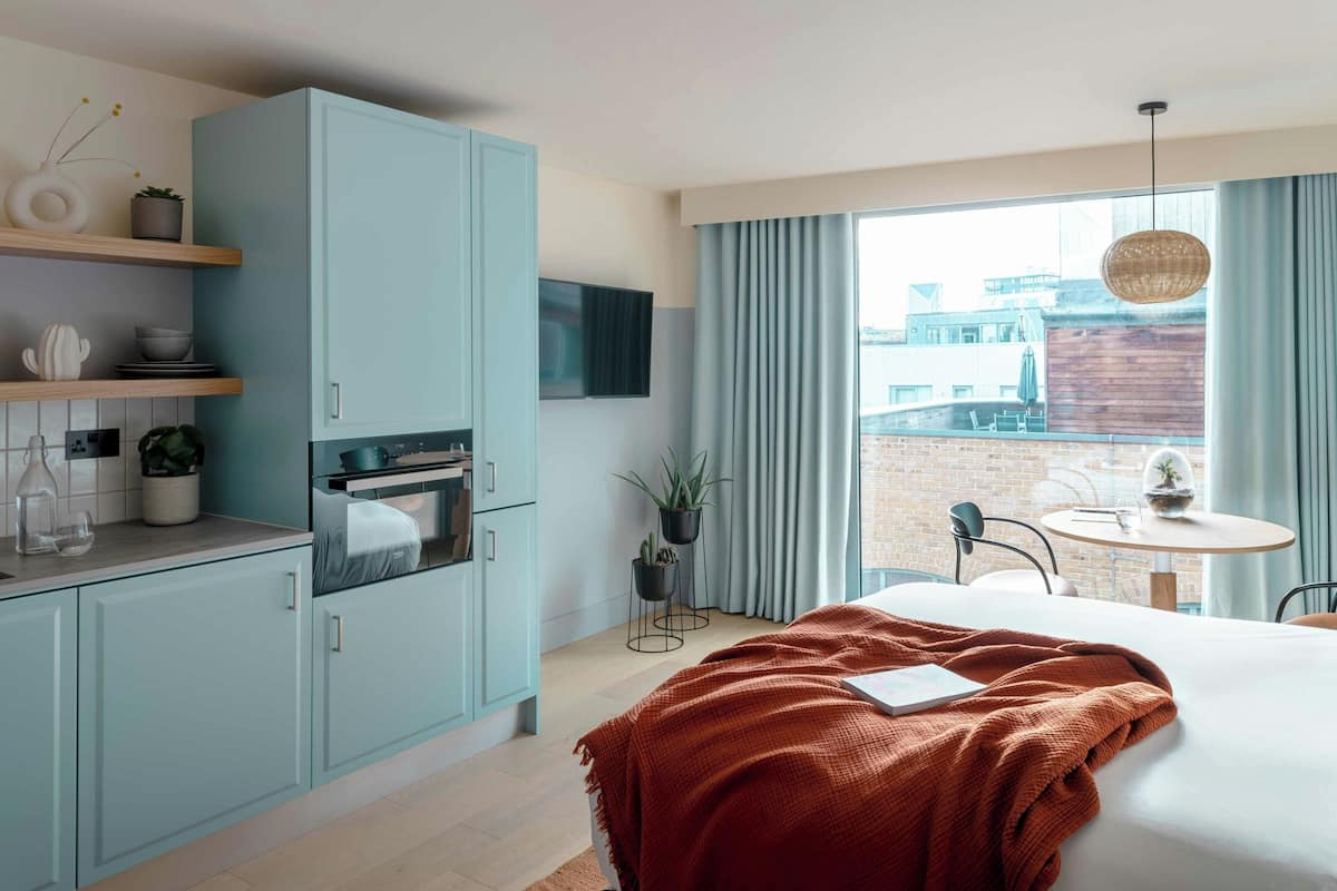 City Studio | Premium bedding, in-room safe, laptop workspace, blackout drapes