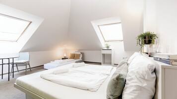 Blackout curtains, soundproofing, free WiFi, bed sheets