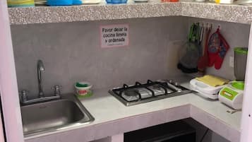 Fridge, microwave, stovetop, cookware/dishes/utensils