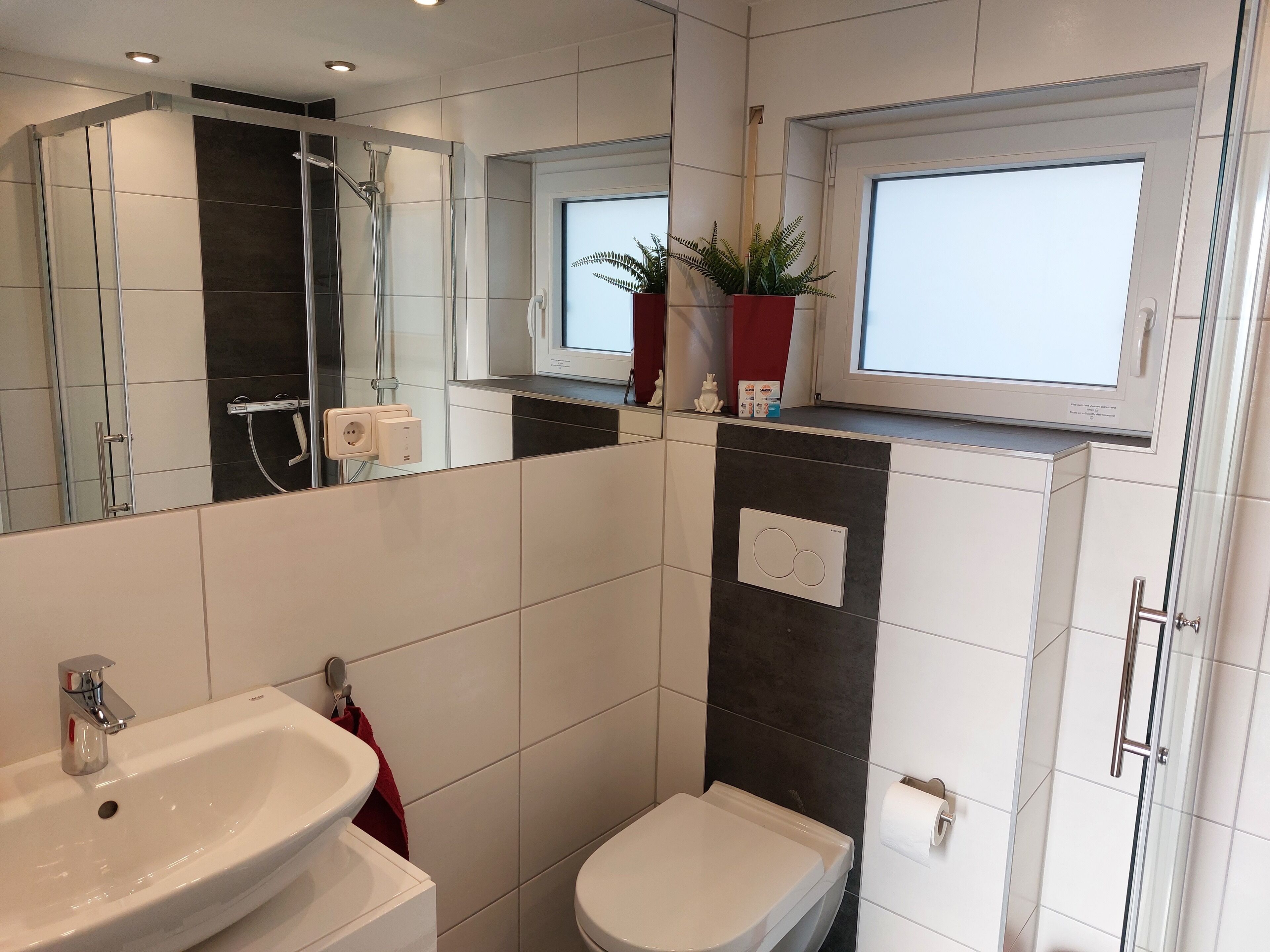Shower, hair dryer, heated floors, towels