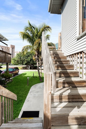 This is a stilt home.  Stairs to front door.