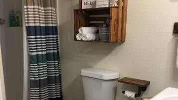 Shower, hair dryer, towels, soap