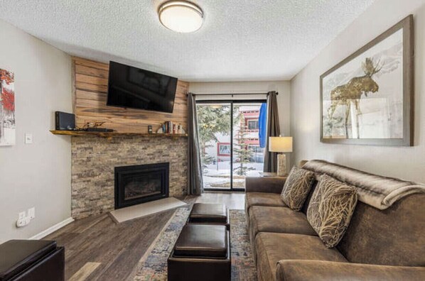 Smart TV, fireplace, books