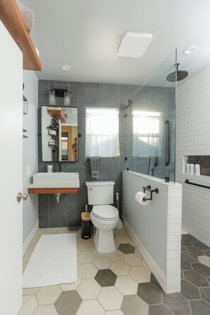 Shower, hair dryer, towels, soap