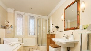 Combined shower/tub, hair dryer, towels, soap