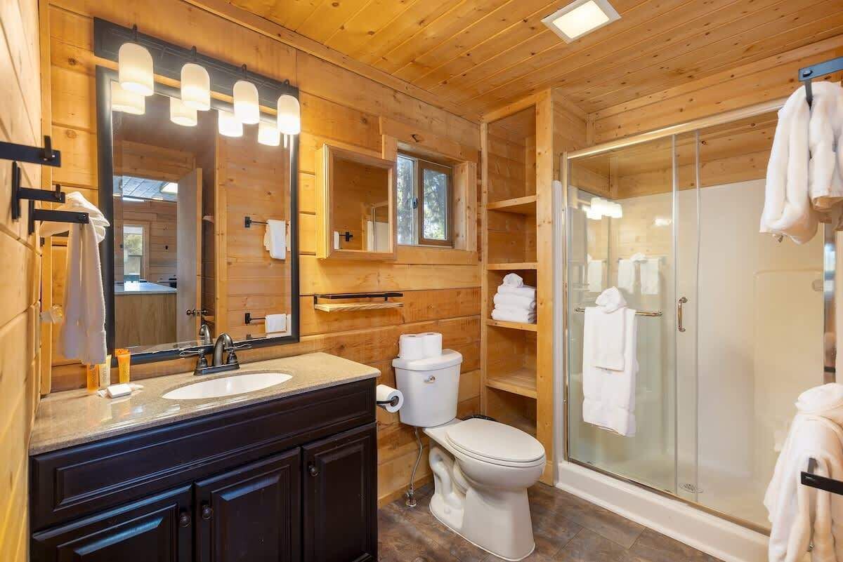 Shower, hair dryer, towels, shampoo