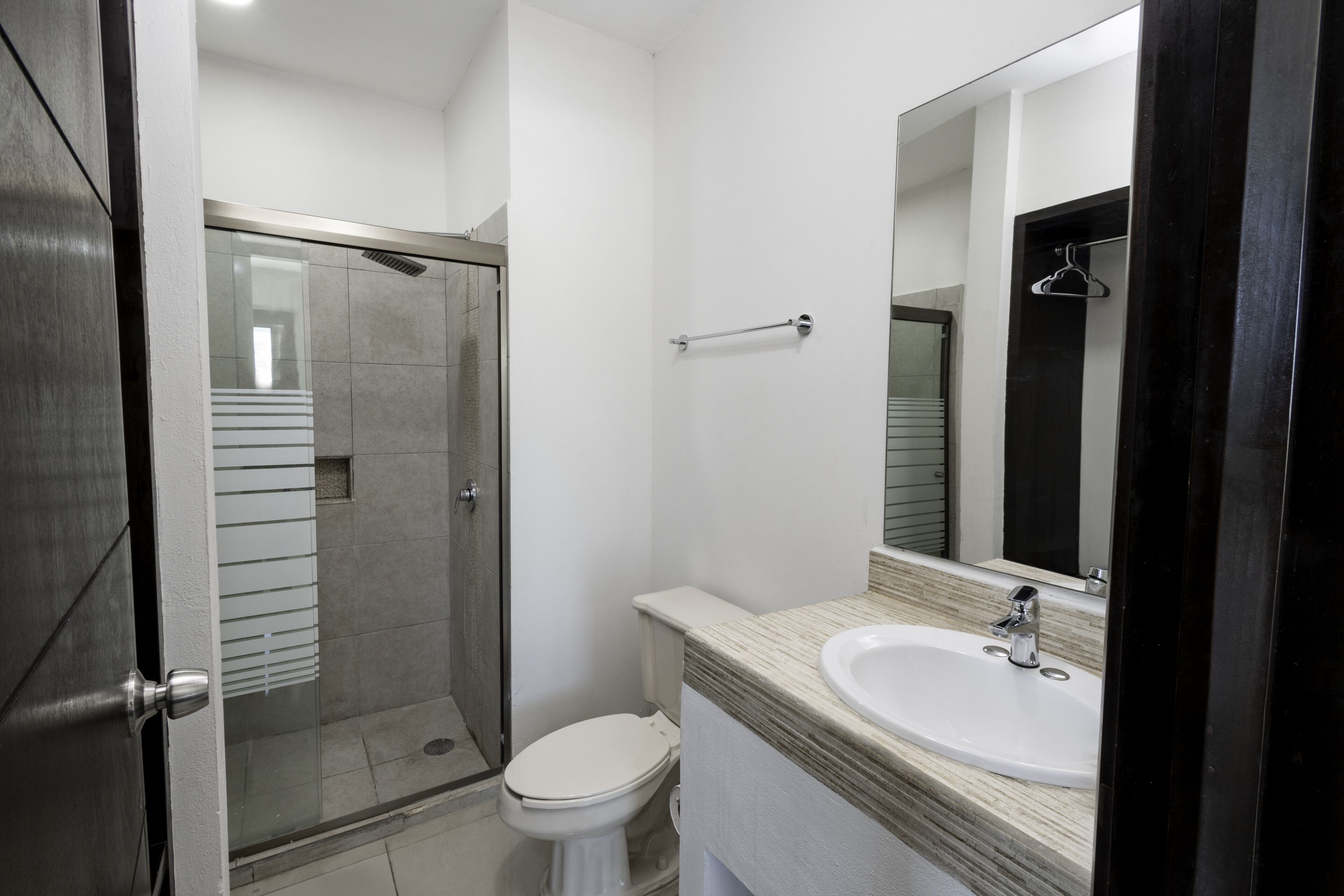 junior room | bathroom | shower, rainfall showerhead, hair dryer, towels