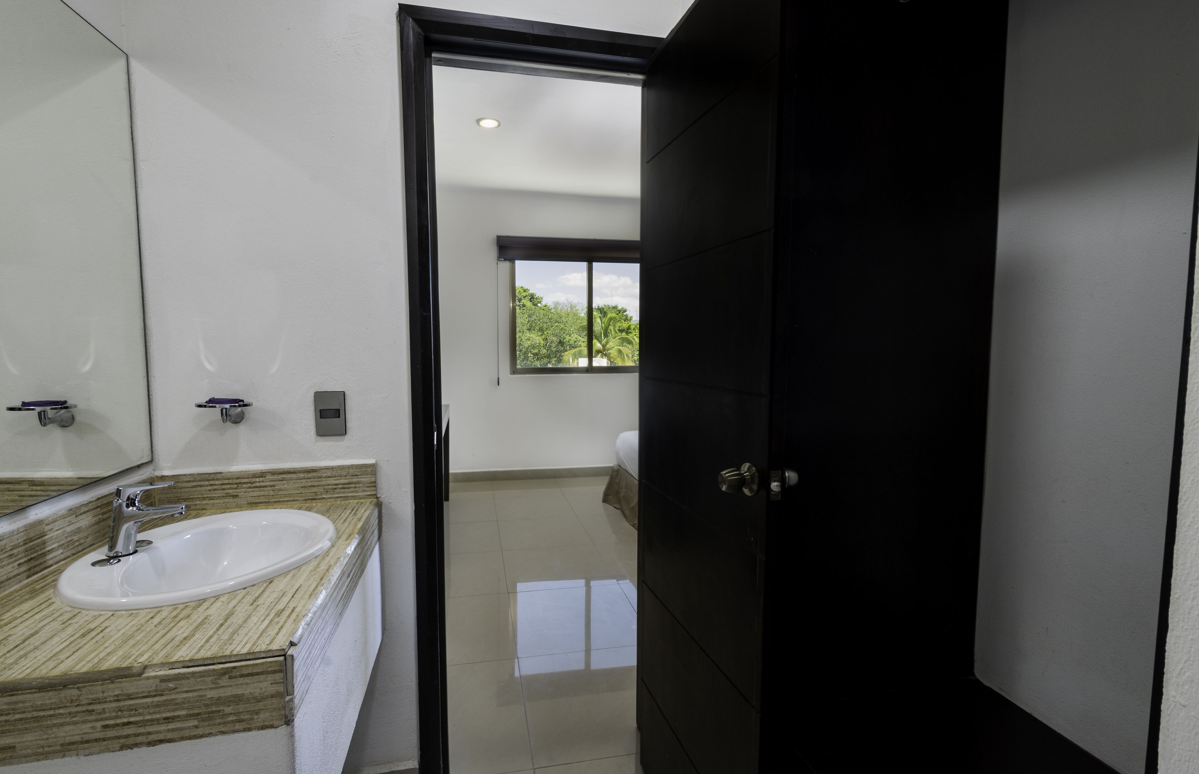 junior room | bathroom | shower, rainfall showerhead, hair dryer, towels