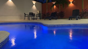 Outdoor pool, open 8:00 AM to 10:00 PM, pool umbrellas, sun loungers