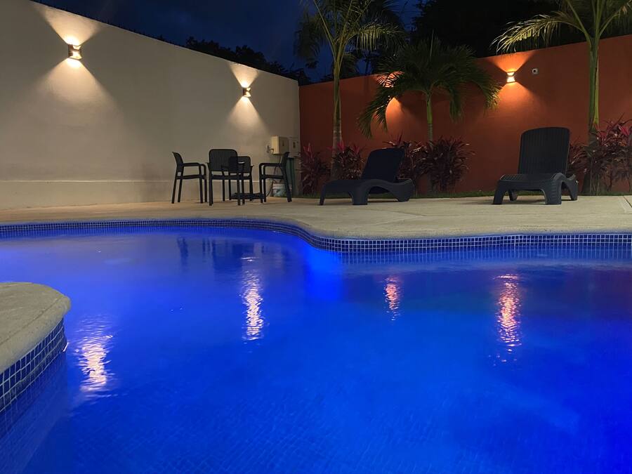 Outdoor pool, open 8:00 AM to 10:00 PM, pool umbrellas, sun loungers