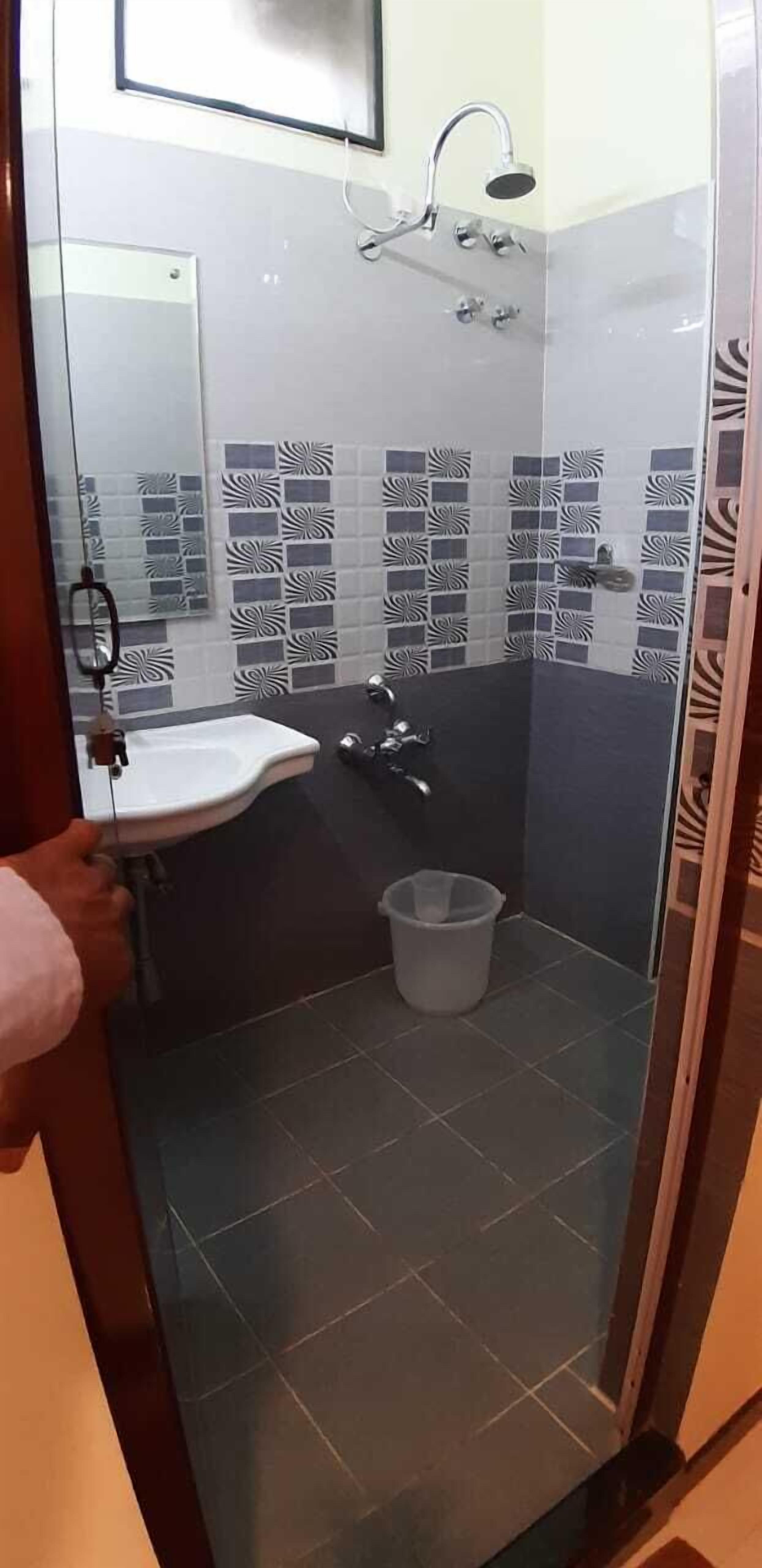 luxury suite | bathroom | shower, rainfall showerhead, free toiletries, dressing gowns