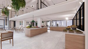 Eine großzügige, moderne Hotelhalle mit einer zentralen Insellounge, Sitzbereichen und großen Fenstern.