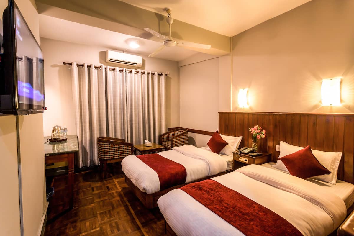 Deluxe Twin Room | 1 bedroom, individually furnished, desk, laptop workspace