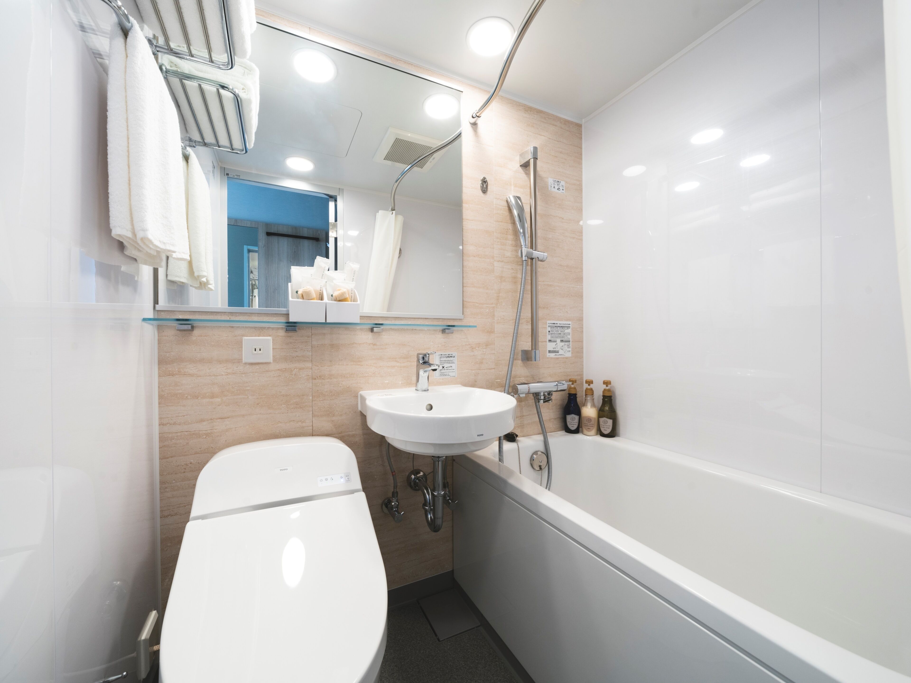 free toiletries, hair dryer, slippers, electronic bidet