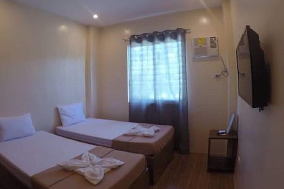 Quarto duplo luxo, 2 camas de solteiro | Wi-Fi de cortesia