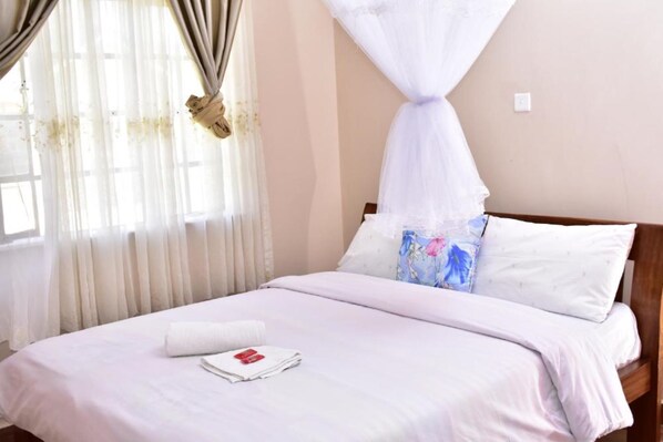 Chambre double | Bureau, accès au Wi-Fi (inclus), literie fournie