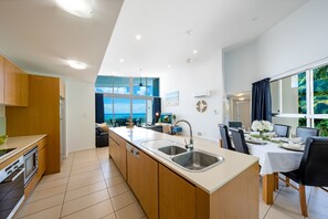 Apartment, 3 Bedrooms | Private kitchen | Full-size fridge, microwave, oven, stovetop - Sea Forever on Azure - Airlie Beach (Airlie Beach)