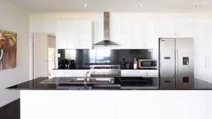 House, 4 Bedrooms | Private kitchen | Espresso maker, full-size fridge, microwave, oven