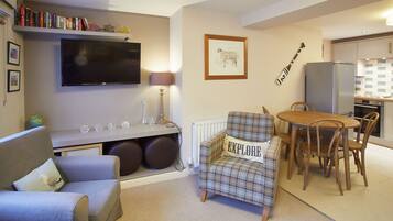 2 Bedroom Room House | Living area | TV