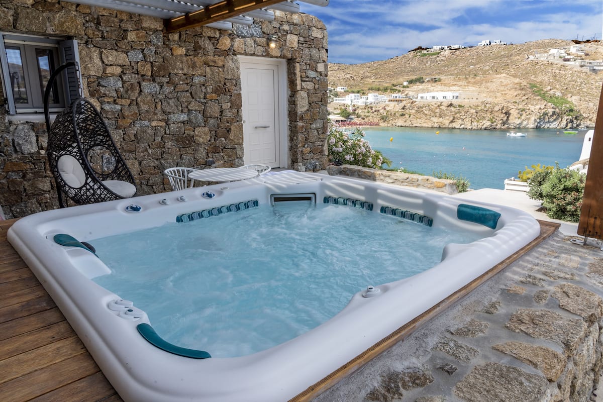 Junior Suite, Hot Tub, Sea View (Sunset) | Private spa tub