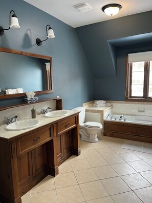 Bathtub, jetted bath, hair dryer, towels