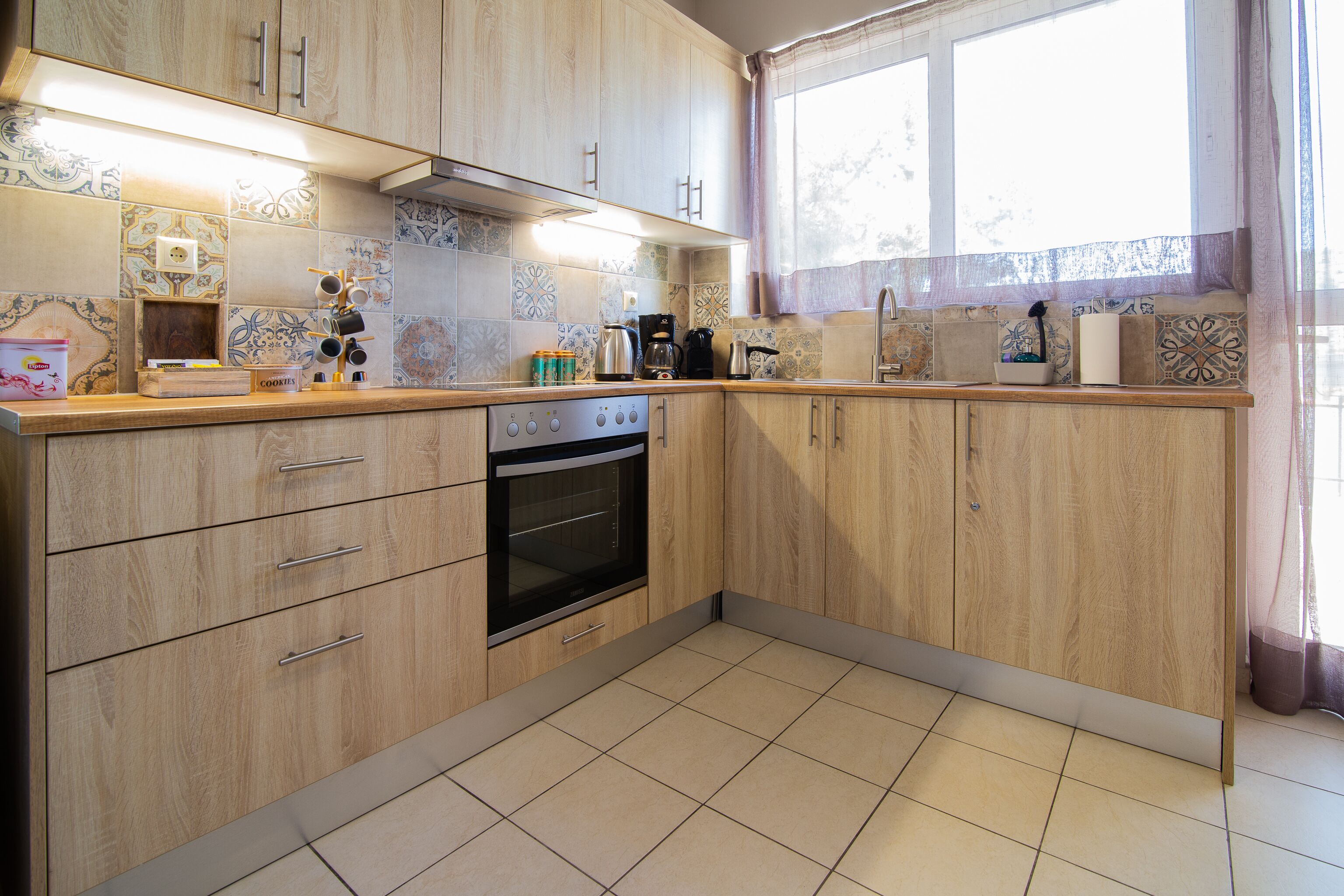 family apartment | private kitchen | full-sized fridge, oven, stovetop, espresso maker