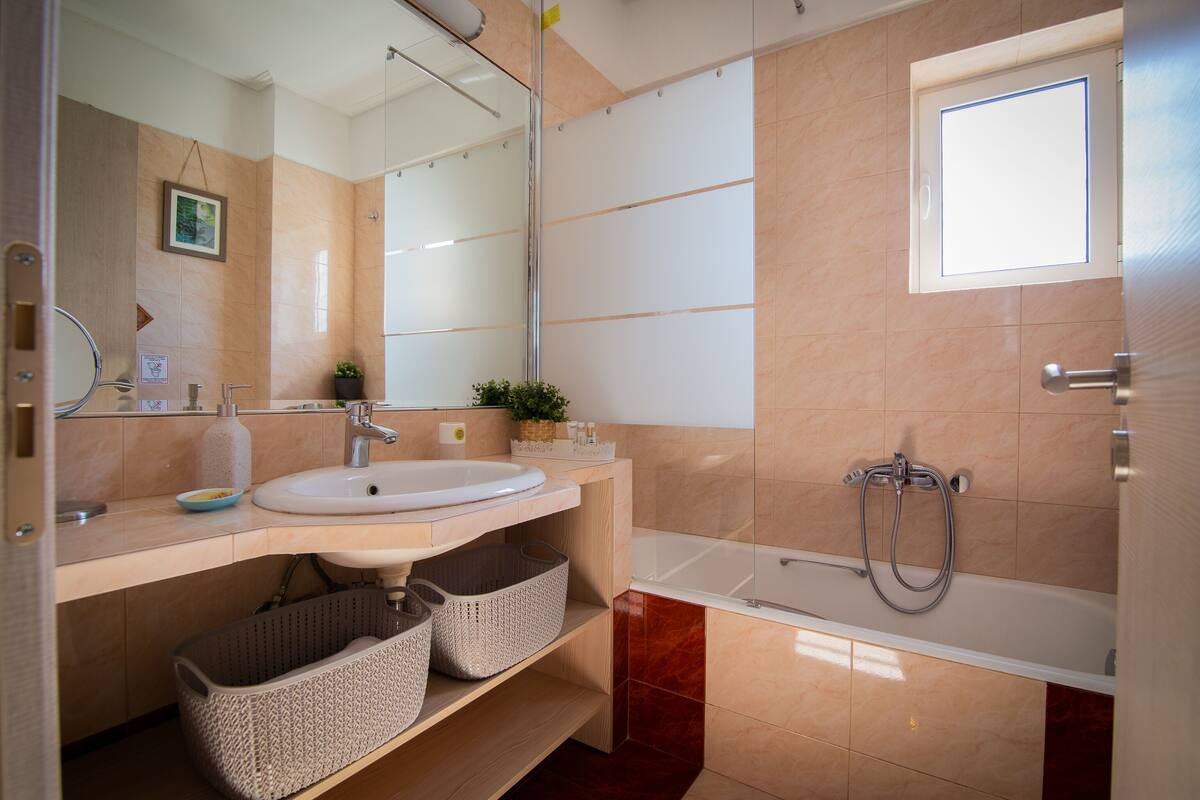 family apartment | bathroom | hair dryer, towels