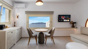 Studio Suite Mewah | Area keluarga | TV layar datar