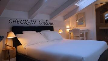 Family Triple Room | Individually decorated, individually furnished, desk, blackout drapes