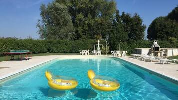 Seasonal outdoor pool, pool umbrellas, pool loungers