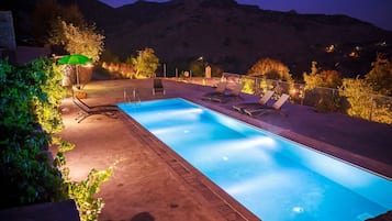 Seasonal outdoor pool, pool umbrellas, pool loungers