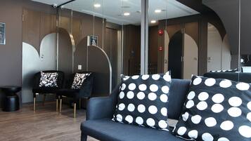 16-inch flat-screen TV with cable channels, TV