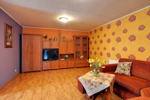 Deluxe-Apartment | Wohnzimmer | Fernseher