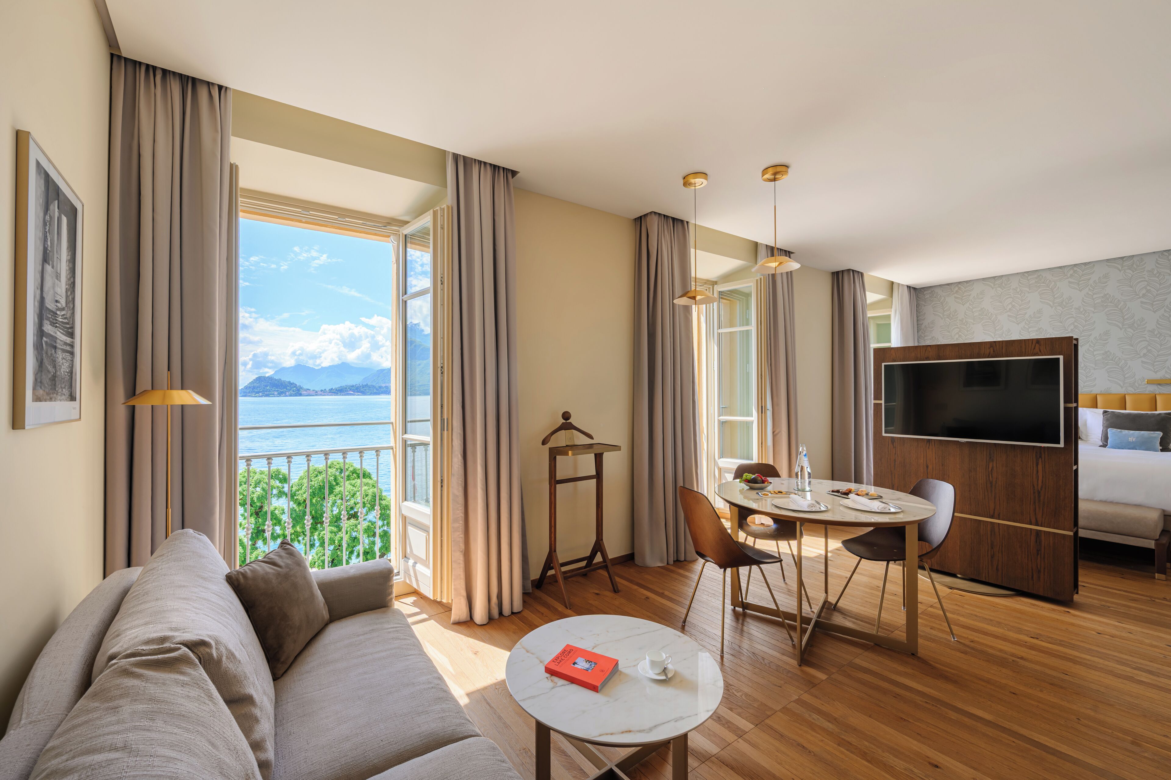 Junior Suite, Lake View | Living area | Flat-screen TV