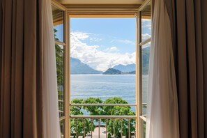 Junior Suite, Lake View | 1 bedroom, premium bedding, down comforters, minibar