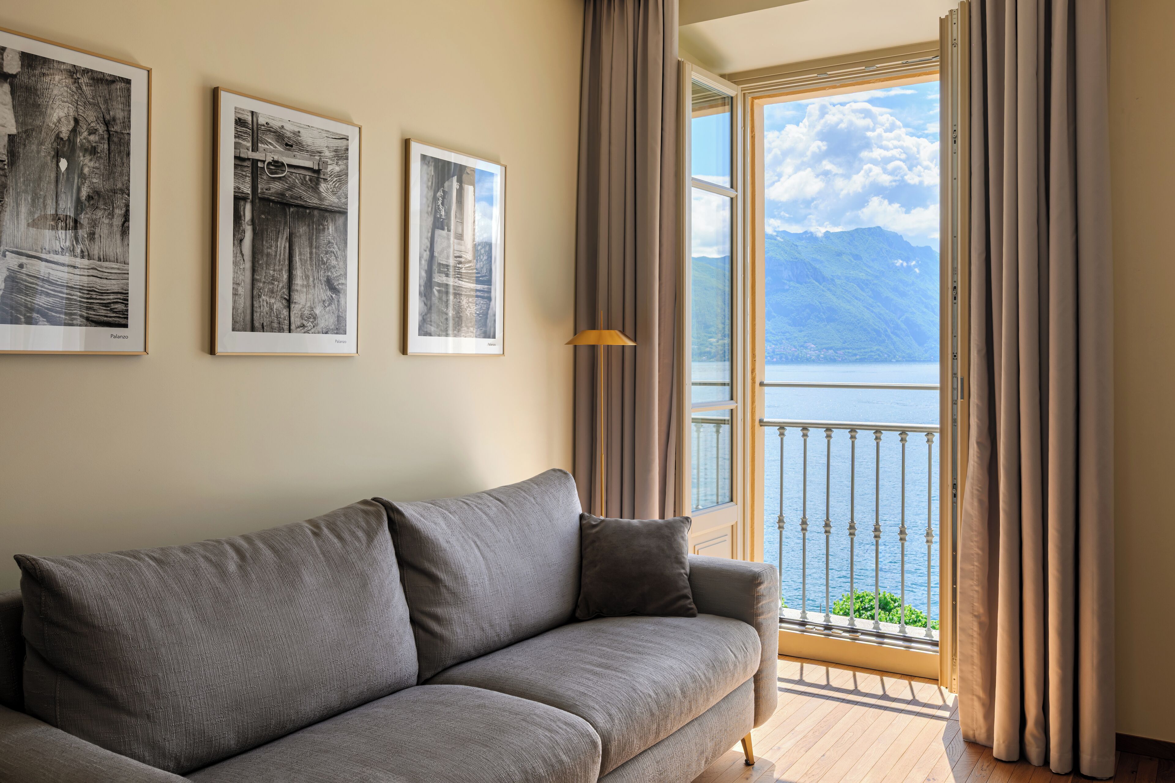 junior suite, lake view | living area | flat-screen tv