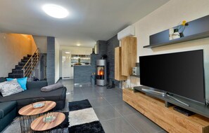 Smart TV, fireplace, foosball